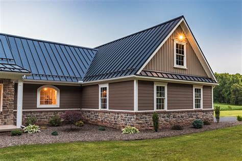 brown metal roof house|gray houses with brown roofs.